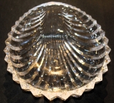 Up for sale is this Beautiful Crystal Clam Shaped Table Bowl in excellent condition with no chips or cracks. Measures approx. 11 3/4"L by 11 1/4"W by 4"D. Shipping Excludes: Alaska/Hawaii, US Protectorates, APO/FPO, PO BoxShipping Provid