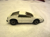 VTG 1978 HOT WHEELS ROYAL FLASH LOTUS ESPRIT, WHITE BY MATTEL INC
1:64 SCALE, CHROME COLORED WHEELS, BLACK INTERIOR, YELLOW WINDOWS, DIE CAST, MADE IN HONG KONG,
