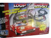 Collectable Artin loop shot racing track. This item comes in the original factory box and instructions on inside top box. Ac power adapter was repaired. This item was tested and works.This item is rare and hard to find.This item comes with all accessories