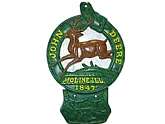 Antique restored replica cast iron wall plaques by John Deere.Made of solid cast iron.Very good condition.�