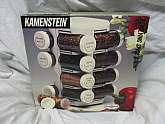 Vintage Kamenstein Plastic 16 Glass Jar Revolving Spice Rack. Revolving Spice rack. New old stock. Factory box will not be in perfect condition. Ball bearing carousel spins for easy access. Rack sits on countertop or fits into cabinet. Jar caps are clearl