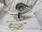 This item will look used but in very good condition and still works. Does not come in original factory box.Design: MCM retro chrome electric corded hair dryer with a brown handle and a chrome stand. Item has on/off switch. You plug it in and it works.
