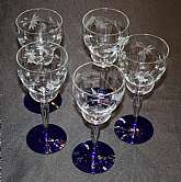 Up for sale are these Weston Glass Set Of Five Etched Blown Water Goblets With a Cobalt Base Circa 1913 - 1932 In excellent condition with no chips or cracks. They measure approx. 7 3/4"T by 3 1/4"W.Shipping Excludes: Alaska/Hawaii, US Protect