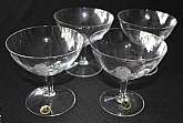 Up for sale are these Beautiful Vintage Helios West Germany Crystal Stemware With A Etched Rose Set Of Four Champagne Glasses. They are in excellent condition with no chips or cracks. They measure approx. 4 1/8"T by 4"W and hold approx. 8 ounces