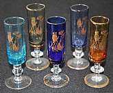 Up for sale are these Courting Scene Vintage Set Of Five Glasses. They measure approx. 4 1/2"T by 1 1/4"W.  There are no chips or cracks. There is some gold wear. Shipping Excludes: Alaska/Hawaii, US Protectorates, APO/FPO, PO BoxShipping Pro