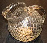 Up for sale is this Waterford  Or Waffle Depression Glass Ball Pitcher in excellent condition with no chips or cracks. Beautiful pitcher.  Holds about 2 quarts. Shipping Excludes: Alaska/Hawaii, US Protectorates, APO/FPO, PO BoxShipping Provided to the