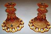 Up for sale are these pair of Westmoreland Colored Laced Edged Glass Circa 1930 Candle Stick Holders in great condition with no chips or cracks. They measure approx. 4 1/2 inches tall. Nice color. Marked with the WG on the reverse. Shipping Excludes: Al