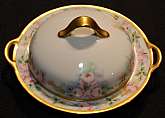 Up for sale is this Royal Bayreuth Antique Pink Rose Floral Covered Butter Dish in great condition with no chips, cracks or crazing. Minor Gold Wear. The Butter Dish measures approx. 8 1/2"W from handle to handle. This mark was used around 1902. Plea