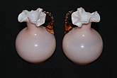 Up for sale are these vintage used Pink Peach Cased Glass Set of Two Matching Pitchers in excellent condition with no chips or cracks. They measure approx. 7"Tall. Shipping Excludes: Alaska/Hawaii, US Protectorates, APO/FPO, PO BoxShipping Provide