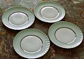 Up for sale are these Rare Royal Tettau South Wind Grey Green Set Of Four Salad Plates in excellent condition with no chips or cracks. They measure approx. 7 3/4"W.  Please see my other sales for more of this beautiful pattern.Shipping Excludes: Al