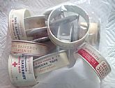 Bag of 6 Vintage Adhesive Medical Tape Containers.