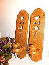 This pair of sconces hold taper candles for beautiful mood lighting. Pennsylvania Dutch farmhouse style home decor made in the USA by Burwood.