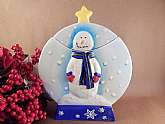 Cookie jar designed to be used all winter. Snowman in a water globe handpainted ceramic kitchen accessory.  