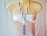 Blue & White Multi Strand Bead Flapper Tassel Necklace Vintage Barrel Beads Lg Egg Bead Tassel Gold Filigree Caps Long Fancy Costume Jewelry. Here is a beautiful multi strand beaded necklace done in the long flapper style and very fancy. It is a piece