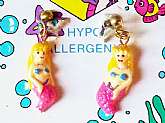 Here is a really cute pair of New Vintage Merry Mermaid Earrings Hypo Allergenic by Harry Ash Expressive Kids Novelty Jewelry from 1992. These are from my Grandmother's estate jewelry collection and are new never worn and still on card. They are for pierc
