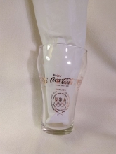 Set of 6 glasses with 'Enjoy Coca Cola' in gold lettering and 5 different languages.