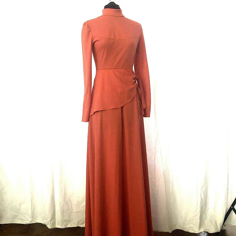 Vintage House of Bianchi 70s formal dress peplum maxi gown in pretty true coral color.  Not sure why my photos made them look dark coral but they are the bright orangy peach coral.  I adjusted the first photo to show color - please not that different bran