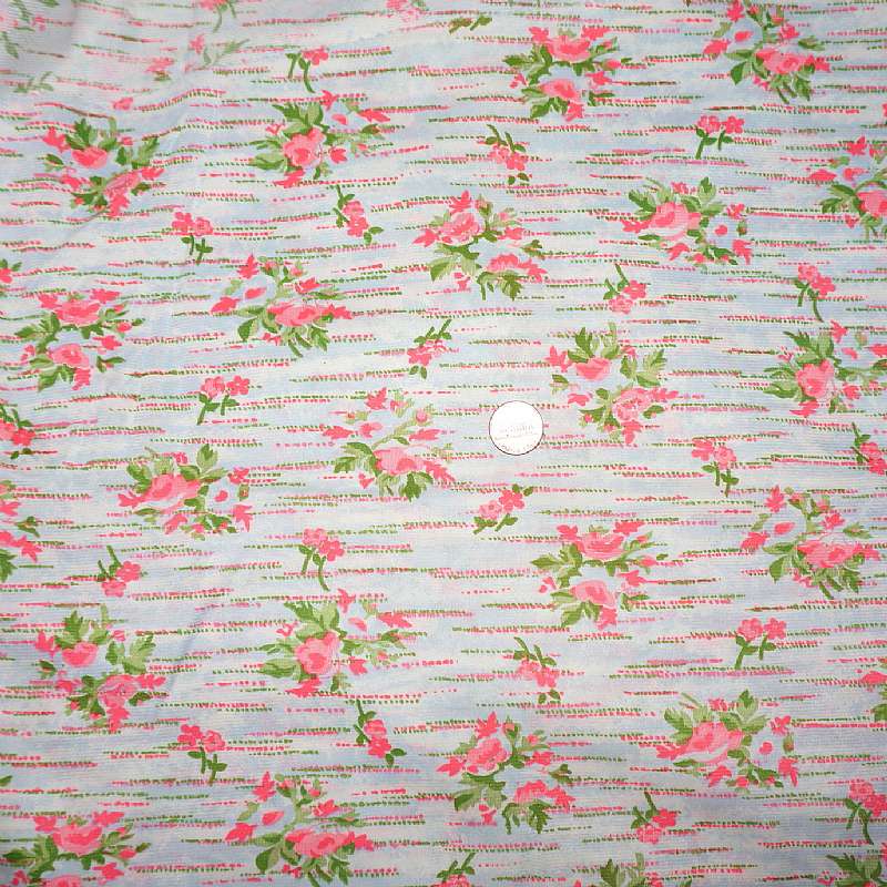 Killer vintage psychedelic floral fabric in a slinky polyester.  The bold colors are fabulous in pink, green, blue and white with rose motif and broken dotted lines. It measures 48 inches wide x 2 yards 8 inches. Pics don't do this lovely fabric justice!
