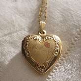 Beautiful vintage gold filled engraved heart Mom locket necklace.
