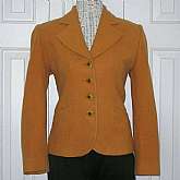 Killer vintage ladies wool riding jacket in a lovely camel color.  It has wonderful buttons and is classically cut.  The jacket is hour glass cut  fits like a dream.  It is fully lined and measures: shoulders 16, sleeves 24, bust 34, waist 28, hips 38, le