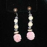 Antique carved rose earrings in pink and cream with sterling screw backs. These are absolutely gorgeous and measure 2 1/4".