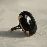 Gorgeous vintage chunky faux black onyx jet glass cabochon ring.   It is pretty heavy and has a big 1