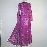 Outstanding vintage 30s glam diva silk chiffon evening gown or party dress with an attached train.  The gown is spectacular and Asian and looks custom made.  The floral print fabric in purple hues with white is beautifully done.  The peplum train is slit