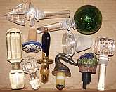 Wonderful array of vintage wine and bottle stoppers in mostly in crystal but also in lucite and pottery. There are some really delightful collectible ones here, most notably, the rare Rosenthal green blown glass crystal ball. Others include a Hans Turnwal
