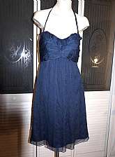 Lovely Amsale tissue silk chiffon convertible halter strapless dress in lovely midnight blue.  It is very figure flattering on and a beautiful design.  Tagged a size 8 and measures bust 34, waist 28, hips 40, length 41.