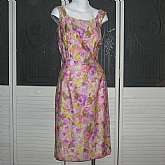 Mod vintage 50s handmade cotton Hawaiian sheath wiggle dress or sundress with pretty floral fabric. We believe the fabric is rayon or polished cotton. The dress is hourglass but loose fitted however it still manages to accentuate the body as the photos sh