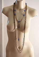 Fabulous one of a kind vintage Venetian art glass and multi chain assemblage necklace.   This beauty features vintage Venetian aventurine (glass with gold or silver foil) beads and several multi strand necklaces.  This was upcycled from three vintage neck