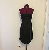 Stunning vintage late 80s Foley ruched black strapless dress in 100% silk. The dress isreally figure flattering on. The dress is beautiful on and definitely a head turner, very chic and sophisticated. It is a fit and flare styling and the measurements are
