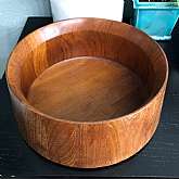Beautiful vintage Eames Era Dansk teak wood salad or decor bowl from Denmark.  This wonderful collectible bowl measures 10 1/2" across the top by 4 1/2" tall and is stamped on the back by the maker.   It is in great vintage condition but could u
