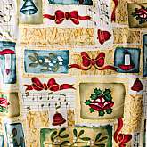 Beautiful gold metallic accented cotton Christmas fabric "Tis The Season” a Joanns exclusive.  The fabric has lovely Christmas bows, candles, bells and musical notes in red, green, blue, tan and gold on a medium cream ground - darke