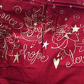 Beautiful blood red and gold metallic print cotton Christmas fabric "Joy Peace Love Border" by Daisy Kingdo  It is super soft and has a nice hand.  The photos don't do this beautiful fabric justice.   It is perfect for a Christmas tree skirt, a