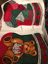 Beautiful vintage style oversized Christmas stocking with patchwork pattern on one side and teddy bear pattern on the other.  The stocking measures around 19" tall by 15.5" wide.  There are 10 complete stockings in the yardage.   The photos don'