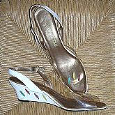 Vintage California Magdesians applique  slingback shoes in clear plastic and leather.  They are platform wedges with leather \lLeaves appliqued on the tops and on the heels. They are multicolor on the clear plastic and white leather in red, yellow, purple