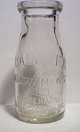 This Vintage Dairylea Dairy Men's League Co-Operative Association Inc Half Pint Milk Bottle  measures 5 1/2 inches high by 2 3/8 inch in diameter at the bottom. Crystal clear glass with a few light scratches and pits.  No cracks or chips.  The bottle is i
