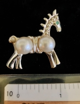 Figural gold tone faux pearl brooch