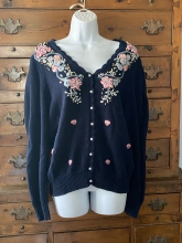 Pearl button Floral embroidery. Measures 44" around the armpits  Cotton ramie blend