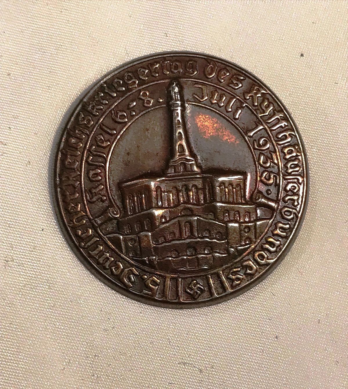 In German - "Deutscher Reichskriegertag des Kyffhauserbundes Kassel Juli 6 - 8 1935" tinnie