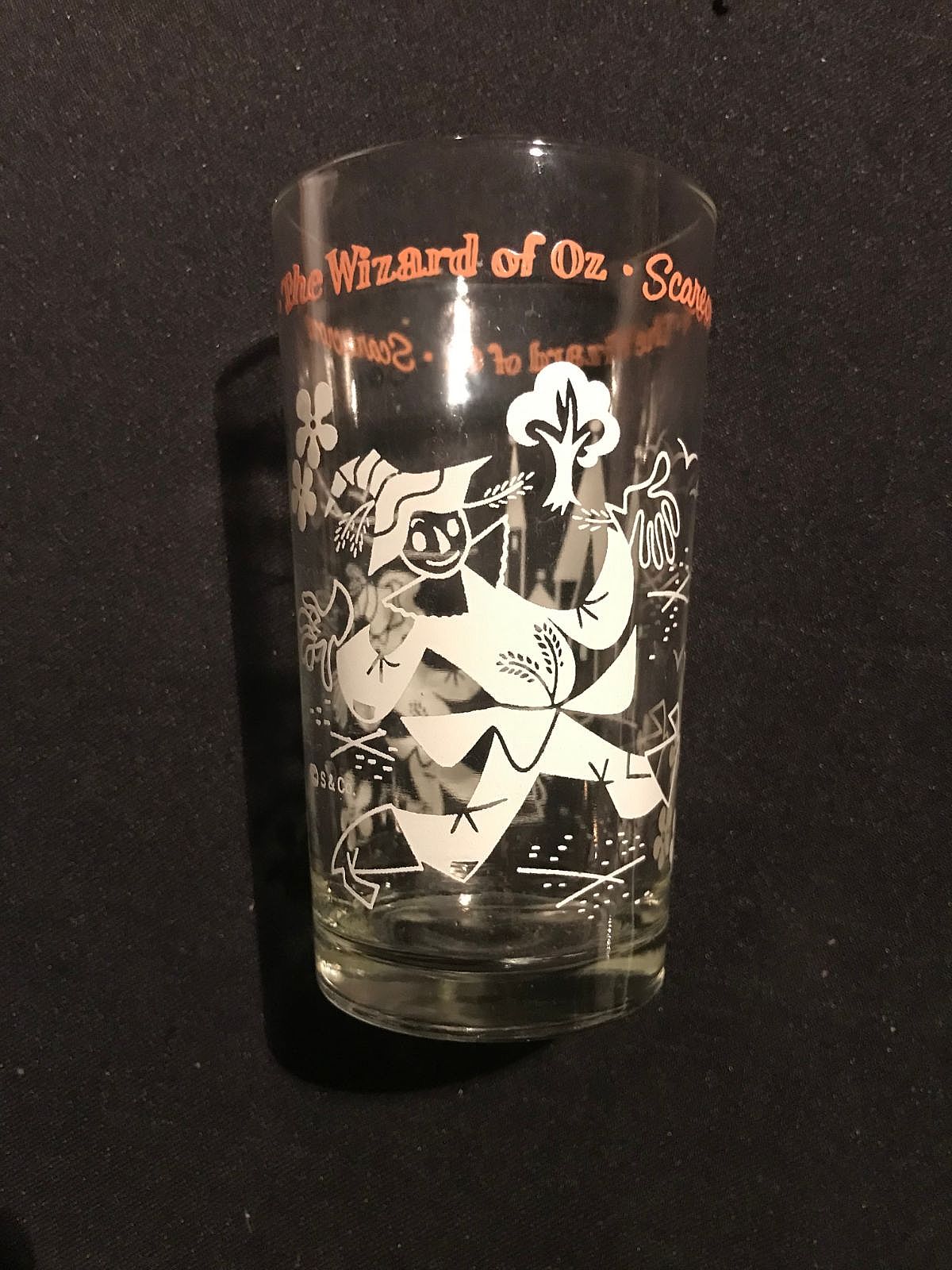 Swift & Co. produced two primary series of Wizard of Oz peanut butter glasses starting in 1953, with significant variations in base design and character artwork.