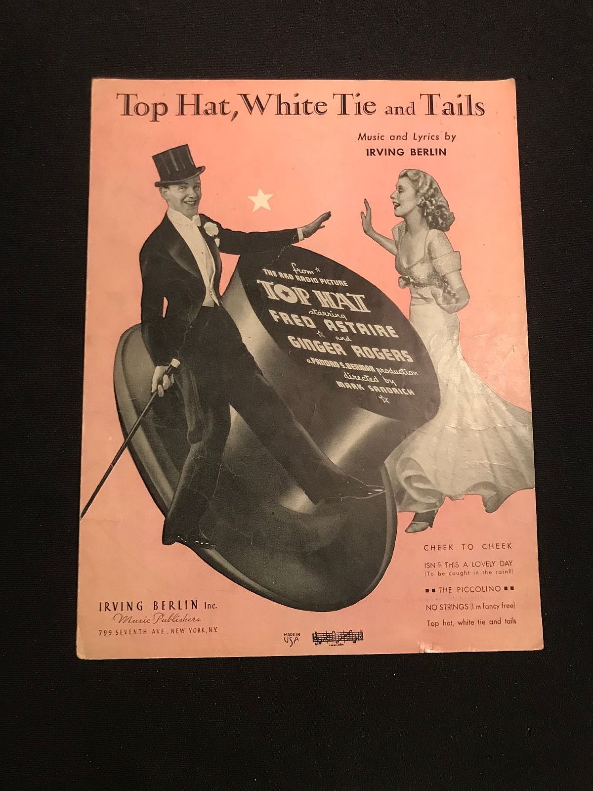 Top Hat is a classic 1935 American musical comedy film starring Fred Astaire and Ginger Rogers, widely considered their most iconic and successful collaboration featuring a famous Irving Berlin score including the title song "Top Hat, White Tie and Tails"