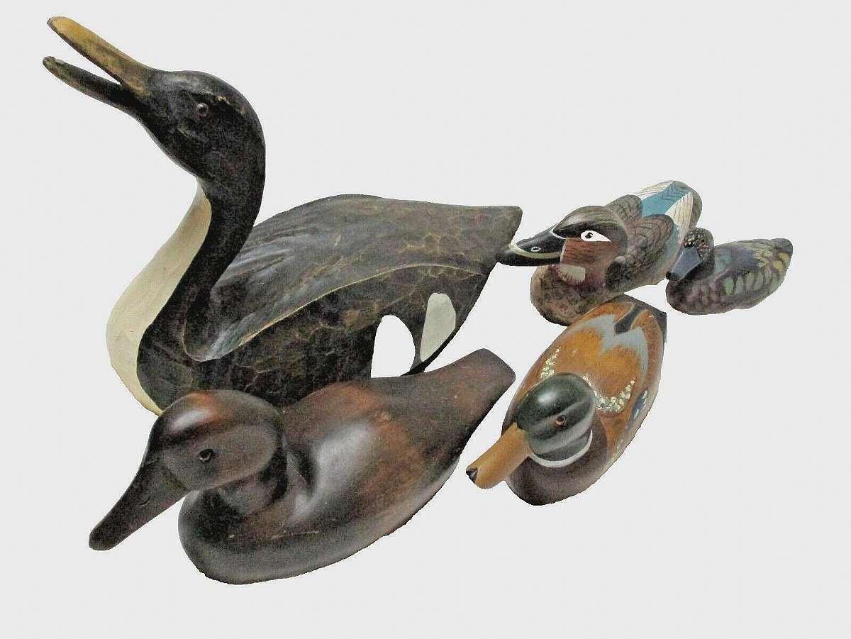 Lot of 5 mallard ducks. A family of ducks. Can not guarantee that all of them are real wood and all of them are mallard ducks. All ducks are hollow inside. I thing the only one that is wood is the largest duck. All ducks will look used and have scraches o