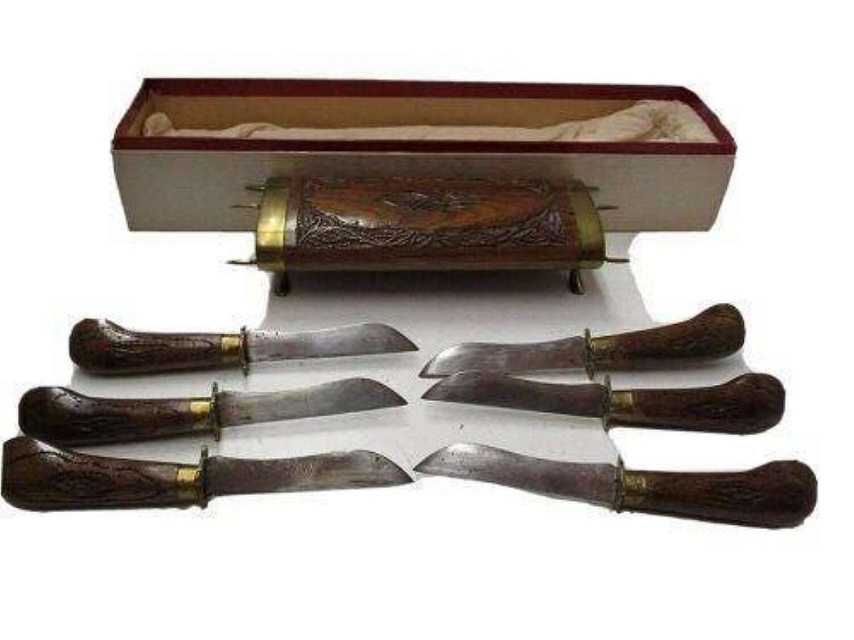 Vintage Bichuwa India Sword Dagger Six Blade Ornate with Hand. They come in a Carved hand-crafted wood case. The daggers blades have lubricant on them, so they do not rust. Includes 6 sword Knifes all the same size with original factory case. In very good