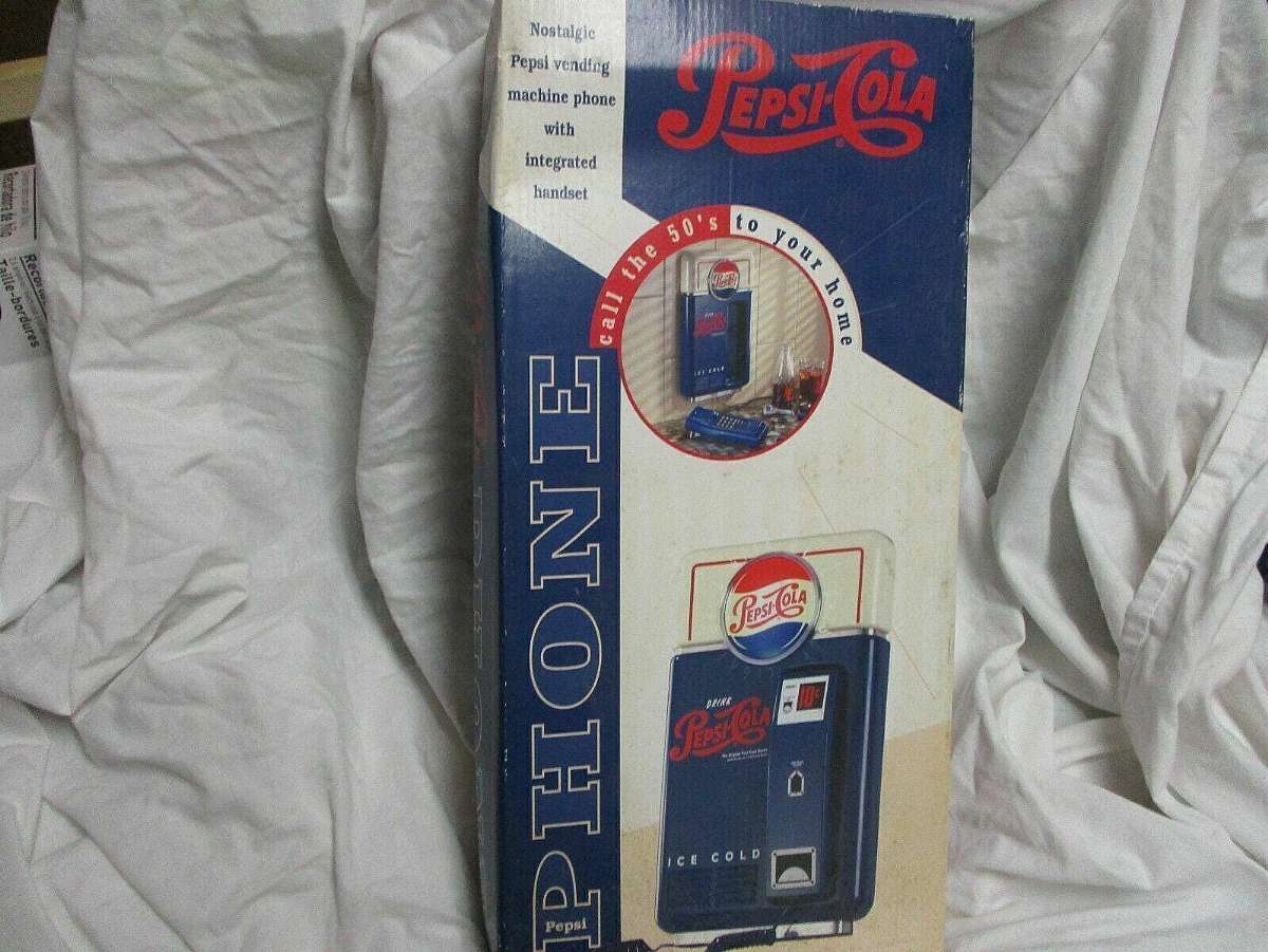 New old stock and box never opened.Factory box not in the best condition.The Pepsi Cola Nostalgic Vending Machine Phone is a vintage electronics product that combines the charm of a classic vending machine with the convenience of a modern phone. Featuring