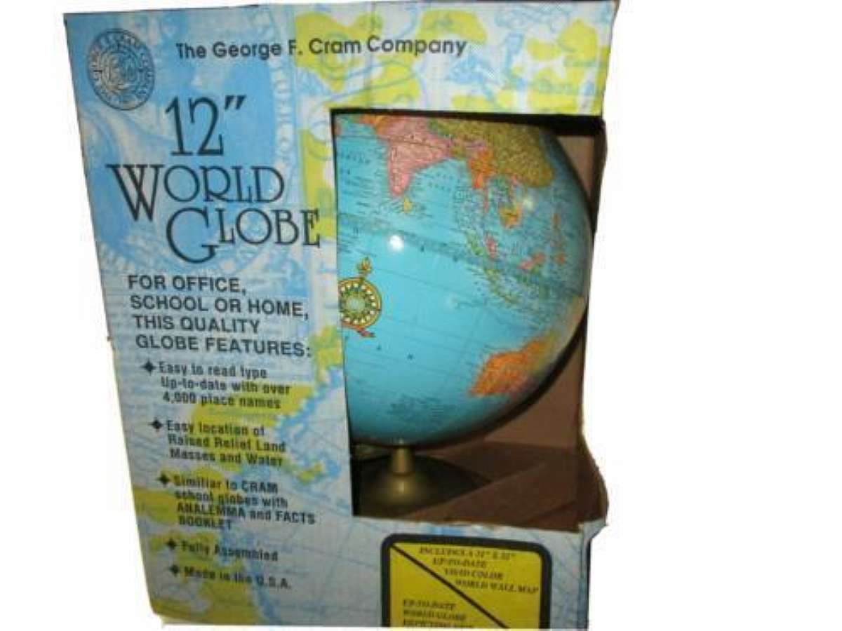 The George F. Cram Company 12" World Globe. Includes a 21" x 32" vivid color world wall map.New old stock.The Blue Ocean 12in. Tabletop Globe with a Champagne Base is a beautifully crafted decorative piece perfect for any home or office.