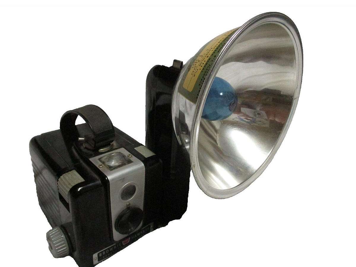 Camera may not look exactly like the one in my listing pictures but will be a Brownie Haweye 123. Vintage 1950"s Brownie Hawkeye Camera Flash Model. This camera overall in very good condition but will still look used.Â  Of course this item