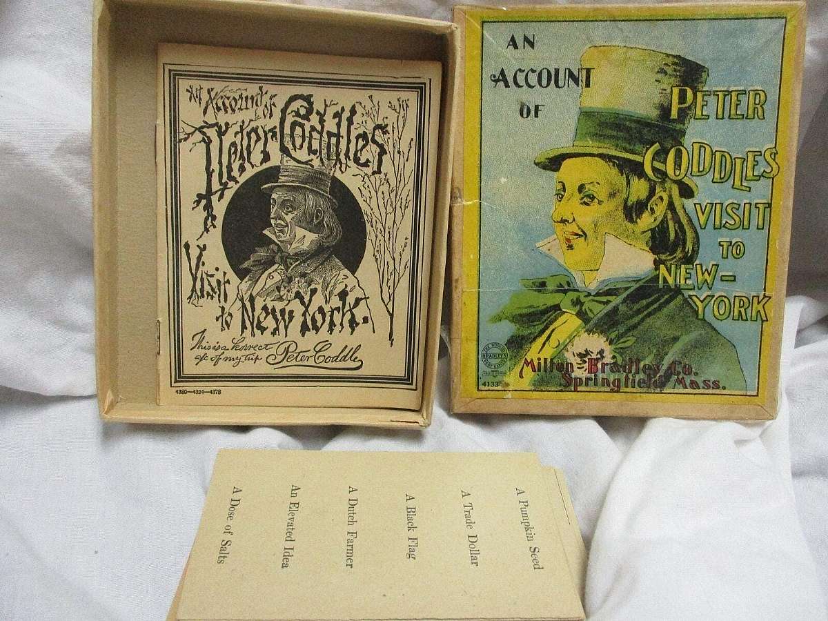 USED ITEM  1890 Peter Coddles Visit to New York Account of Card Game. This item comes in original factory box with 24 cards and instructions. 1 playing card is missing. The box is not in the best condition and everything looks aged because of the age of i