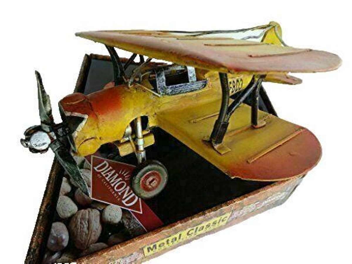 New old stock.The Vintage Airplane Yellow Metal Classic Collection 2000-02 by Sherwood Brand Diamond features a classic design of a yellow metal airplane, perfect for aviation enthusiasts and collectors. This collectible piece captures the nostalgia and c